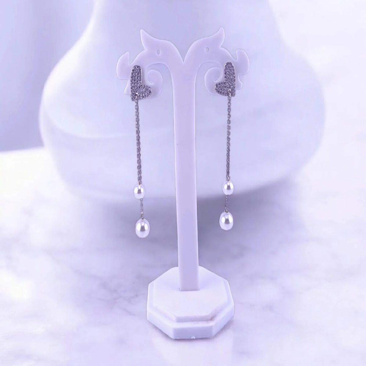 Heart design earrings with pearl latkan